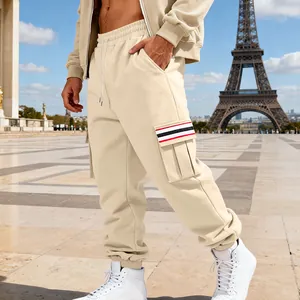 Men's stylish beige fleece cargo sweatpants with multi-pockets and striped detail.