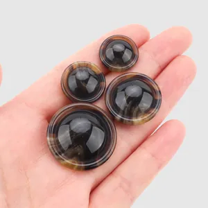 Marbled resin buttons in four sizes for coats and high-end apparel.
