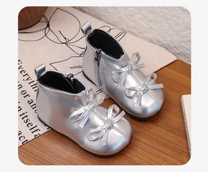 Elegant silver baby girl princess boots featuring double bow details and side zipper