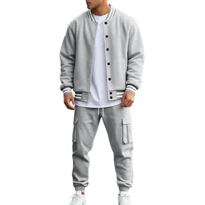 Full body view of men's grey American style varsity jacket and cargo pants set