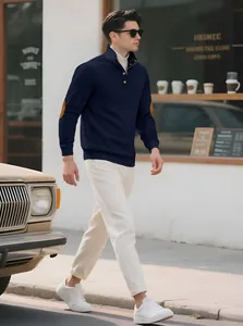 Casual navy blue quarter-zip jacquard knit sweater with brown elbow patches for men