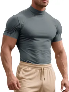 Macro view of men's grey slim fit mock neck T-shirt highlighting muscle definition.