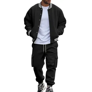 Close-up detail of men's black fleece-lined varsity jacket and jogger pants set