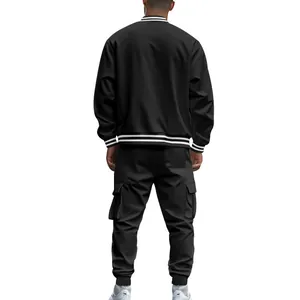 Full back view of men's black American style varsity jacket and matching cargo pants set