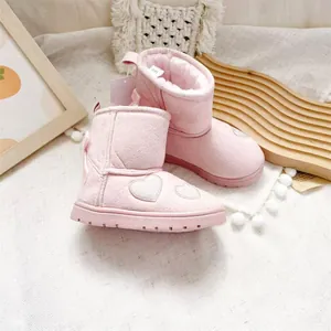 Detail of pink toddler snow boots showing heart embroidery and soft faux fur lining