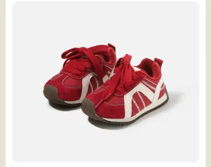 Side view of toddler red fleece-lined sneakers featuring decorative white wavy stripes