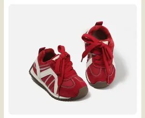 Detailed view of red winter baby walking shoes with warm fleece lining and soft sole
