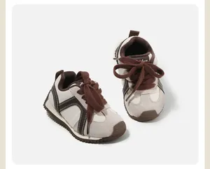 Close-up of children's winter walking shoes featuring cozy fleece lining and brown laces
