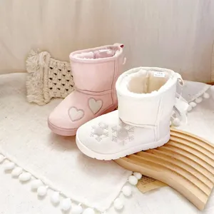 Warm winter girl's embroidered snow boots with thick faux fur lining and a cute heel bow