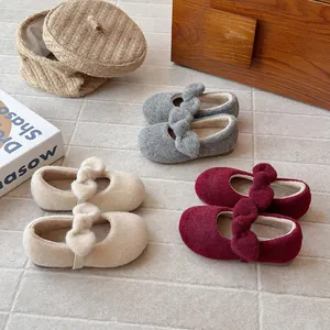 Charming girls' felt princess shoes with decorative bows, fleece-lined for winter warmth.