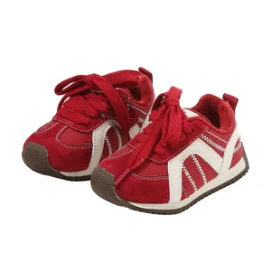 Red toddler winter sneakers featuring warm plush lining and soft non-slip rubber sole