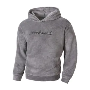 Cozy grey fleece hoodie with black Muscleattack embroidery and warm inner lining for winter