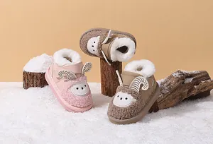 Detailed view of baby cartoon sheep snow boots with warm plush lining and soft sole