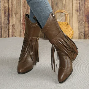 Fashionable western cowboy mid-calf boots with fringe tassels and metal studs detail