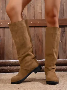 Stylish women's camel faux suede tall boots with low block heel for winter fashion
