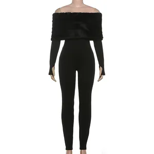 Front view detail of a black off-shoulder jumpsuit with thick faux fur collar trim