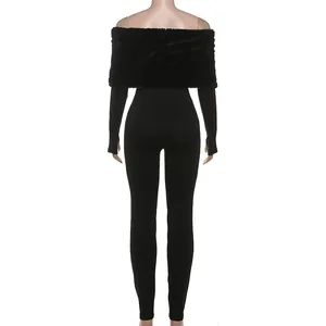 Back view of a black slim jumpsuit with elegant faux fur off-the-shoulder trim