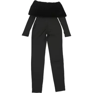 Close-up detail of a black off-shoulder jumpsuit featuring a plush faux fur neckline.