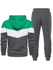 Back view detail of men's 3-color patchwork tracksuit with green white and grey hoodie
