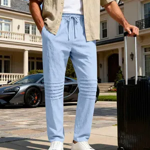 Pantalon en lin bleu clair ample pour homme avec genoux plissés et cordon de serrage