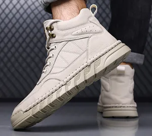 Close-up detail of beige genuine leather high-top Martin boots for men