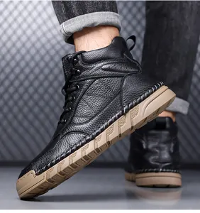 Detailed shot of black genuine leather high-top Martin boots with durable gum sole.