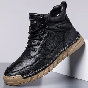 Premium black pebbled leather men's martin boots with a durable tan non-slip rubber sole