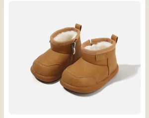 Warm toddler brown snow boots with plush white faux fur lining and easy side zipper