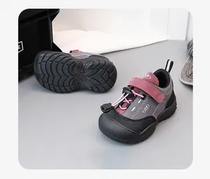 Close-up of children's hiking shoes with non-slip sole and hook-and-loop closure