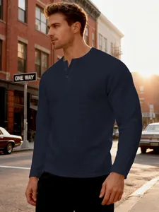 Close-up view of men's heavyweight jacquard texture Henley shirt in navy blue color