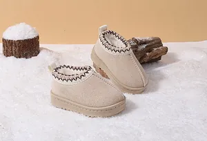 Warm beige toddler snow boots with cozy fleece lining and ethnic embroidery details