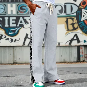 Mens heavy weight streetwear sweatpants featuring paisley side panel and snap buttons