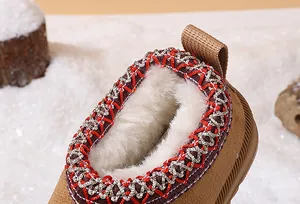Close-up of the warm plush faux fur lining and embroidered collar of toddler snow boots