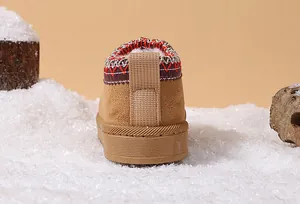 Rear view of warm children's snow boots with soft anti-slip soles for winter usage.