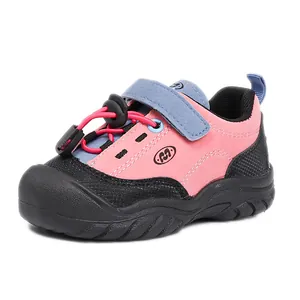 Fashionable pink and blue children's athletic shoe with durable soft sole for hiking