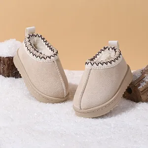 Warm beige children's winter snow boots with plush lining and anti-slip thick sole.
