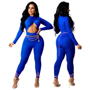 Detail of royal blue sexy crisscross cutout long sleeve jumpsuit with gold chain