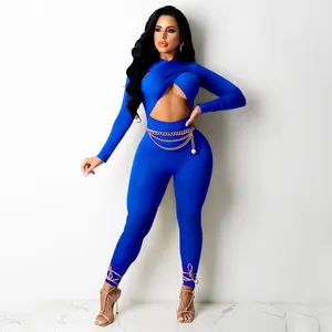 Sexy royal blue crisscross front jumpsuit with hollow-out detail and gold chain belt