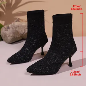 Schwarze glitzernde Strick-Sockenstiefel mit spitzer Kappe und 7,2 cm Pfennigabsatz