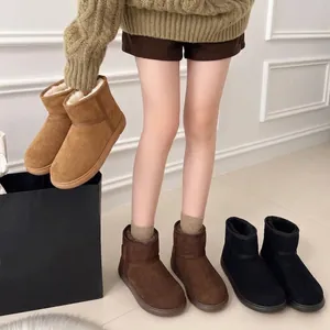 Botas de nieve de invierno con punta redonda en cuero esmerilado marrón y negro