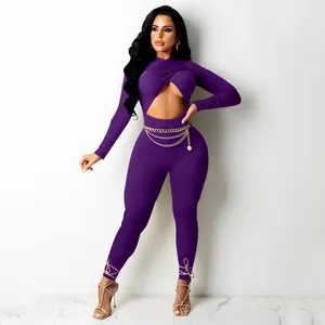 Sexy purple long sleeve criss-cross cutout jumpsuit with gold chain belt detail