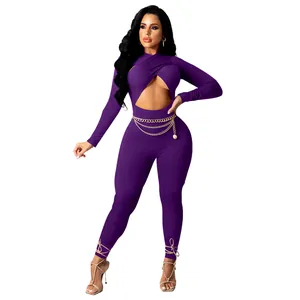 Detailed view of sexy purple crossover cutout bodysuit with chain belt and ankle ties