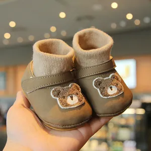 Warm winter baby boy walking shoes with soft soles and cute bear embroidery patch