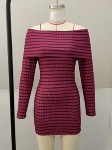 Detail of a maroon and black striped off-shoulder long-sleeved mini dress on a mannequin.