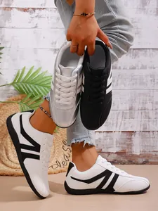 Casual women's GAT sneakers in white, black and silver colors, breathable and light