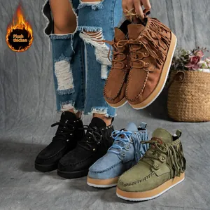 Detailed view of women's Western style fringe boots in multiple colors with plush lining