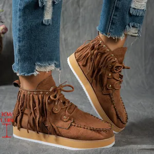 Western style brown suede fringe boots for women featuring a 3cm platform and stud detail