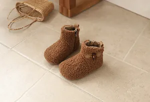 Detailed view of brown sherpa winter boots for toddler girls with side zipper