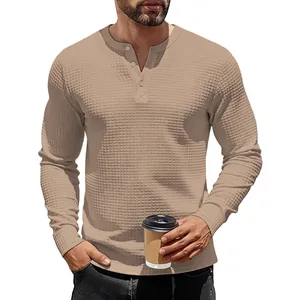 Close-up of men's slim fit waffle knit Henley shirt with long sleeves in khaki color