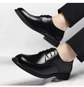 Polished black leather men's business shoes featuring a classic lace-up design.
